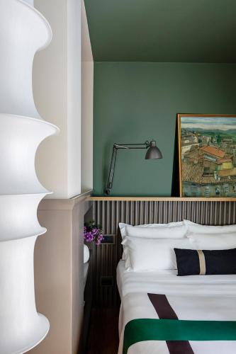 Hotel Priori Secret Gardenにあるベッド