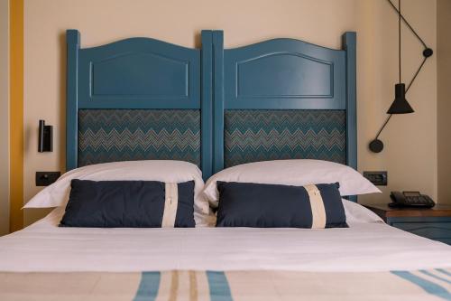 Hotel Priori Secret Gardenにあるベッド