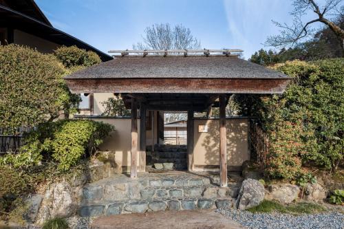 a small pavilion in front of a building at The Westin Miyako Kyoto in Kyoto