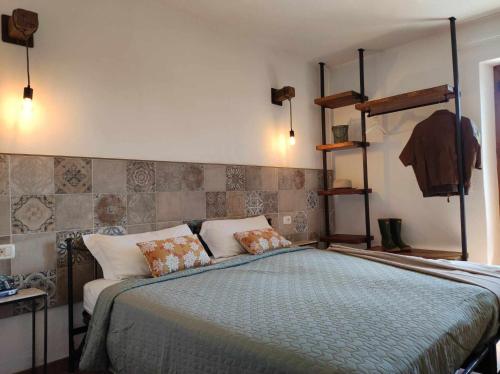 Ένα ή περισσότερα κρεβάτια σε δωμάτιο στο Torre di Celle