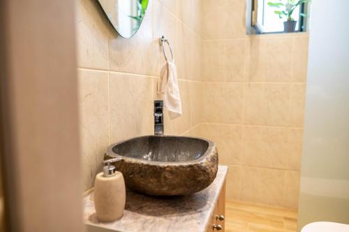 Ванная комната в Kosnian City Suites B