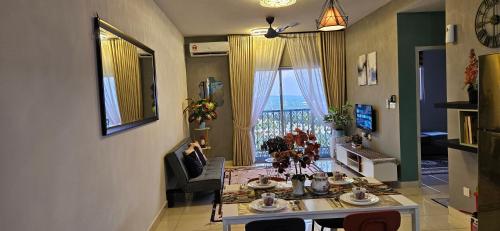 a living room with a table and a window at ER Homestay 2R1B suite nearby KLIA Terminal in Sepang