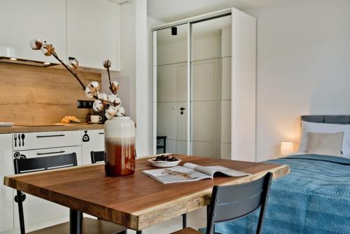 Η κουζίνα ή μικρή κουζίνα στο Apartamenty In Belnihel