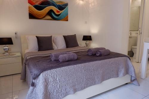 Postel nebo postele na pokoji v ubytování SPQR Studios 2 Valletta