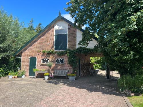 Taman di luar B&B Lekkerkerk