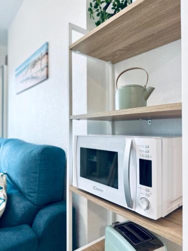 Dapur atau dapur kecil di Face a la Mer - vue epique, climatisation, wifi, draps inclus