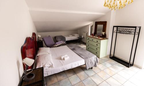 Кровать или кровати в номере Le calendule,relax home & wine
