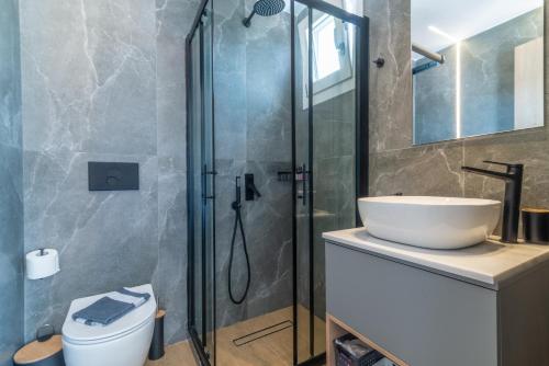 Koupelna v ubytování Luxury SeaSide Suites
