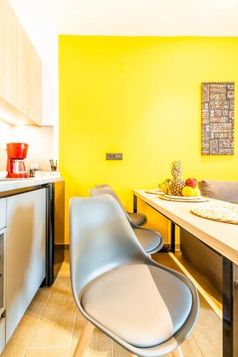 Kuchyň nebo kuchyňský kout v ubytování Luxury SeaSide Suites
