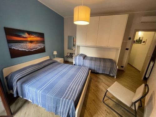Posteľ alebo postele v izbe v ubytovaní Casa Vacanza Giardini Naxos Sarahouse