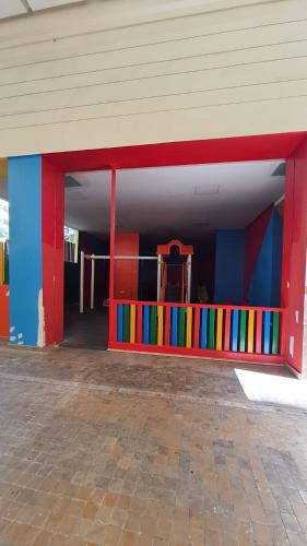 a brightly colored room with a table and a chair at Casa Fainna in Casablanca
