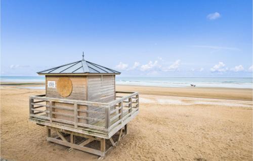 a bird house sitting on the beach at Nice Home In La Croupte With Wifi in La Croupte