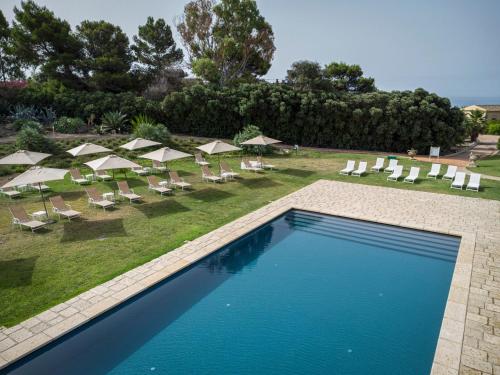 The swimming pool at or close to Falconara Greenblu Resort