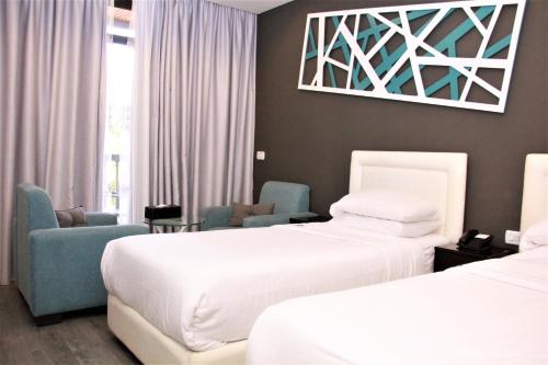 En eller flere senge i et værelse på Beverly Hotel Beirut
