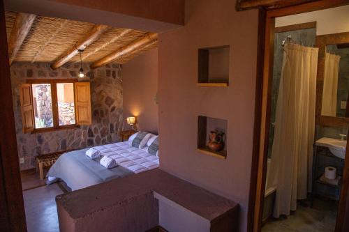 Letto o letti in una camera di CasaCalma Hotel Boutique
