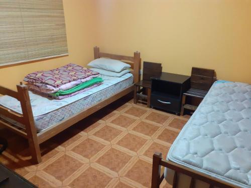 Кровать или кровати в номере El Colibrí 1
