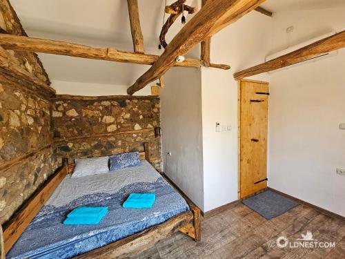 Ένα ή περισσότερα κρεβάτια σε δωμάτιο στο The Old Nest