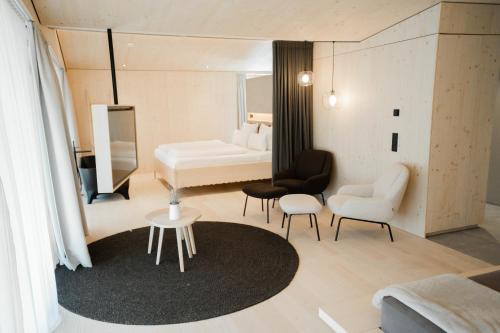 Postel nebo postele na pokoji v ubytování Amrai Suites