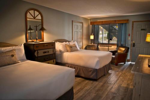 Katil atau katil-katil dalam bilik di Maxwell Mansion Hotel
