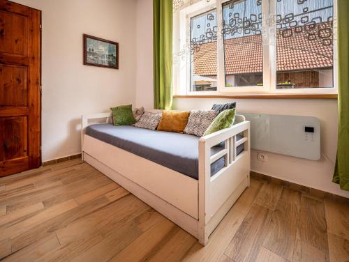 Postel nebo postele na pokoji v ubytování Škorničkův statek