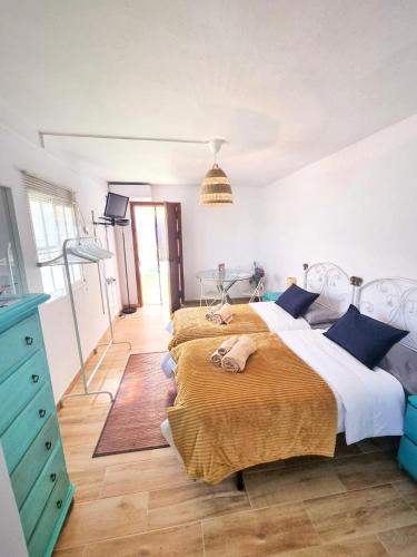 Ένα ή περισσότερα κρεβάτια σε δωμάτιο στο Casita La biznaga