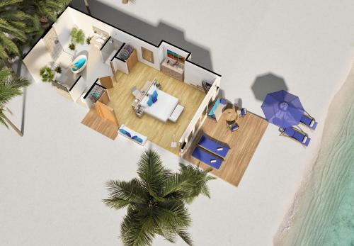 a rendering of a living room with a palm tree at Baglioni Resort Maldives - Luxury All Inclusive in Dhaalu Atoll