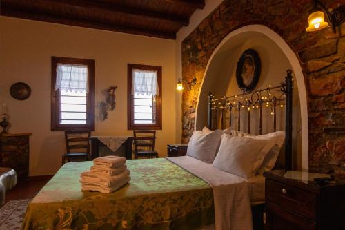 Ένα ή περισσότερα κρεβάτια σε δωμάτιο στο Guesthouse Oneiro