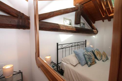 Postel nebo postele na pokoji v ubytování La casa del pittore