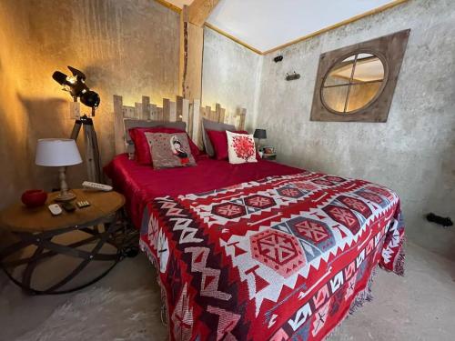 Ένα ή περισσότερα κρεβάτια σε δωμάτιο στο Maison Vigneron - Maison et Studio