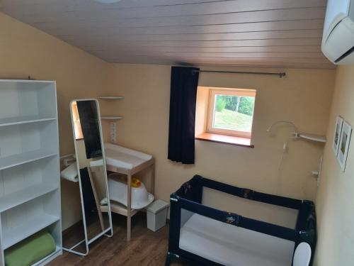 Postel nebo postele na pokoji v ubytování Gite Chez Tiane Saint-Flour-l'étang