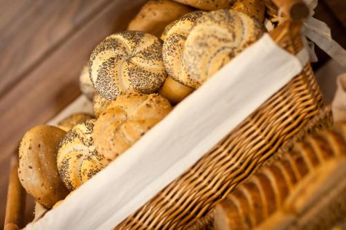 a basket full of bagels sitting on a table at Oasis Resort & Spa in Rewal