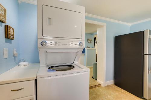 a white stove top oven in a kitchen at Bradenton Vacation Rental Gas Grill and Water Views in Bradenton