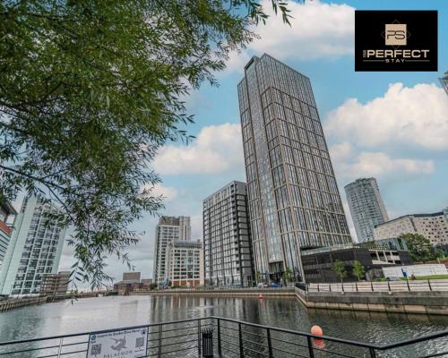 a city with tall buildings and a body of water at The Lexington Liverpool City Centre 24 Hour Gym At By Your Perfect Stay Short Lets Liverpool in Liverpool