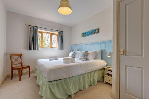 Postel nebo postele na pokoji v ubytování Wash House, Rookery Farm