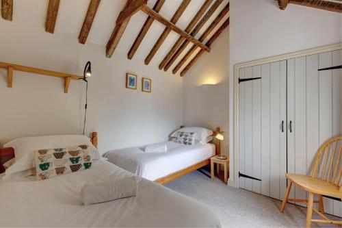 Postel nebo postele na pokoji v ubytování Bolt Hole