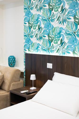Ένα ή περισσότερα κρεβάτια σε δωμάτιο στο NUMISIA Guest House