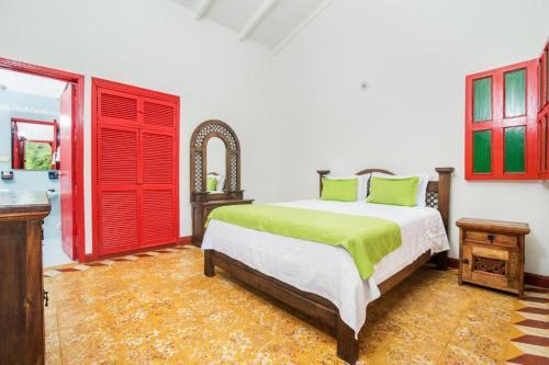 Ένα ή περισσότερα κρεβάτια σε δωμάτιο στο Primavera Ecoalbergue