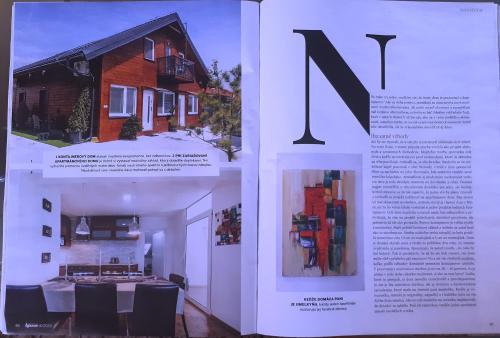a magazine page with a picture of a house at Penzión Florens, Nesvady in Nesvady