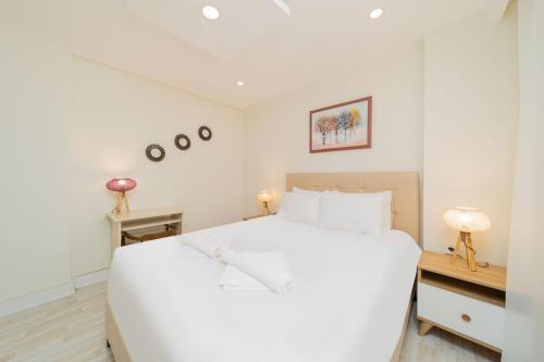 Postel nebo postele na pokoji v ubytování Excellent Flat Close to Kaleici in Muratpasa