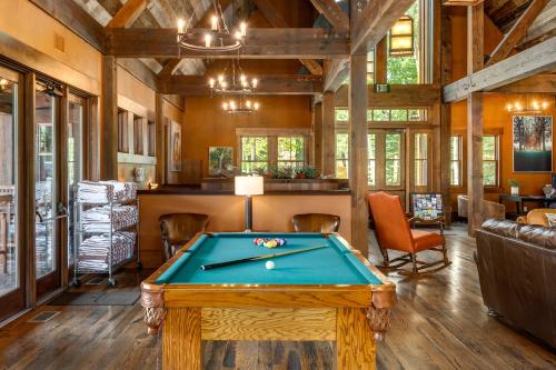 a billiard room with a pool table in a house at The Porches in Steamboat Springs