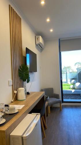Una televisión o centro de entretenimiento en Apart IMEB spa & wellness