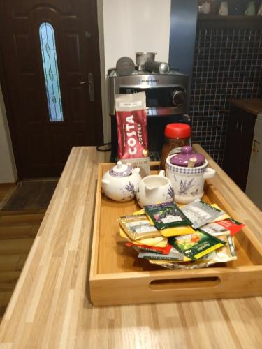 a table with a tray of food on top of it at Lavender Hill Hvar Villa - pool, jacuzzi,sauna,BBQ in Stari Grad