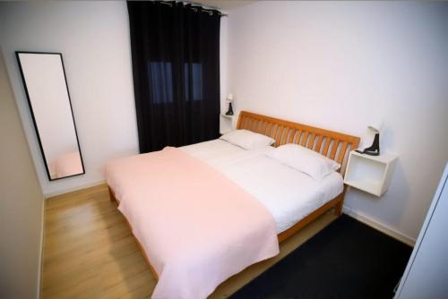 Ένα ή περισσότερα κρεβάτια σε δωμάτιο στο Kuća za odmor Deda Pepo