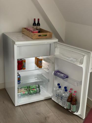 Nápoje v ubytování Bed & Koffie, Op de Spinbaan