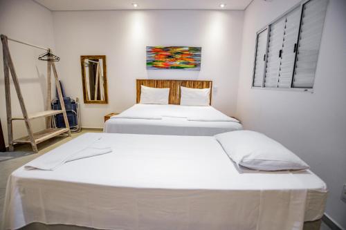 Postel nebo postele na pokoji v ubytování Flats de Sumatra