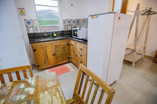 Kuchyň nebo kuchyňský kout v ubytování Flats de Sumatra