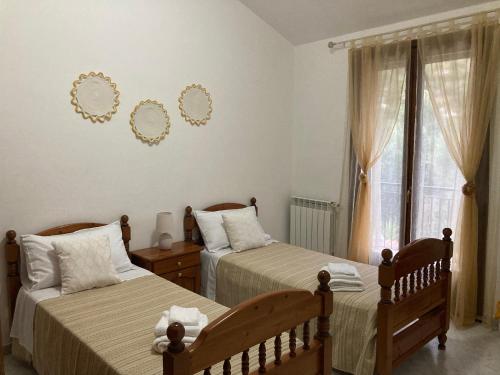 Posteľ alebo postele v izbe v ubytovaní Nonna Lella