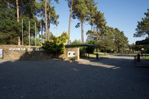 a park with a sign that reads quinilla bc park at Esposende Resort - Golf, Beach, River, Tennis, Pool in Gemezes