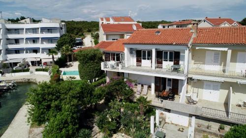 Apartments by the sea Petrcane, Zadar - 21595