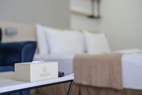 a box sitting on a table in an office at Rooftop Apart-Hotel in Yerevan